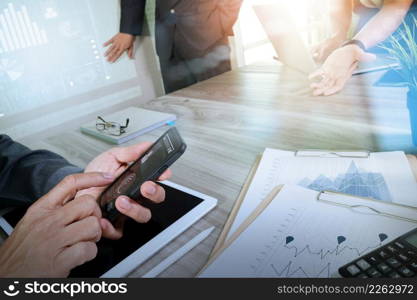 Medicine doctor hand working with modern computer and digital pro tablet with his team with digital medical diagram on wooden desk as medical concept