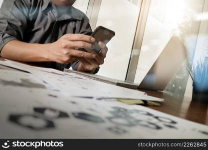 Medicine doctor hand working with modern computer and smart phone with blank screen on wooden desk as medical concept