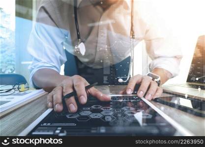 Medicine doctor hand working with modern computer interface and digital tablet computer as medical network concept