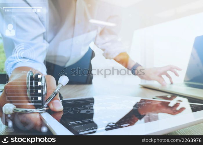 Medicine doctor hand working with modern computer interface and digital tablet computer as medical network concept