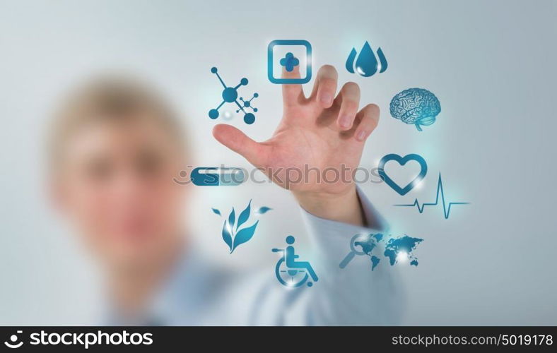 Medicine doctor hand working with modern computer interface as concept