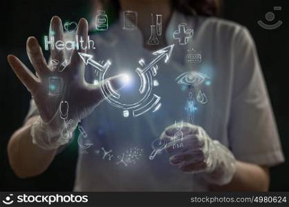 Medicine doctor hand working with modern computer interface as medical concept