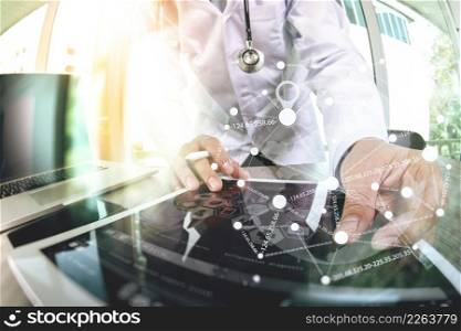 Medicine doctor hand working with modern digital tablet computer with stethoscope as medical network concept