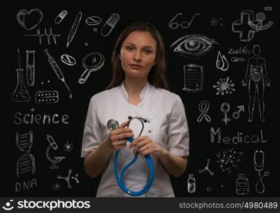 Medicine doctor with many medical symbols around as medical concept