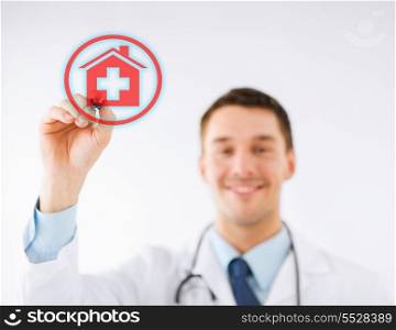 medicine, health and hospital concept - doctor drawing hospital sign in the air with marker