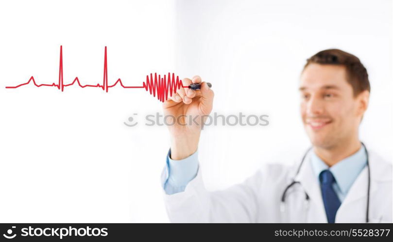 medicine, health and hospital concept - male doctor drawing heart and cardiogram in the air with marker