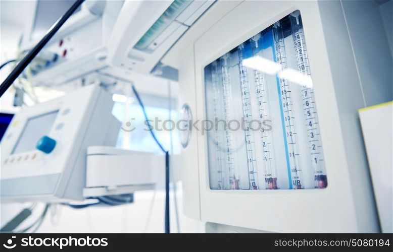 medicine, health care, emergency and medical equipment concept - anesthesia machine at hospital ward or operating room. anesthesia machine at hospital operating room