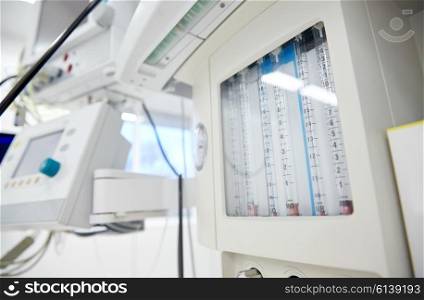 medicine, health care, emergency and medical equipment concept - anesthesia machine at hospital ward or operating room