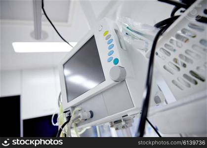 medicine, health care, emergency and medical equipment concept - extracorporeal life support machine at hospital ward or operating room