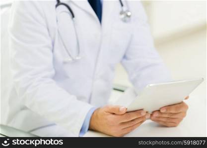 medicine, health care, people and technology concept - close up of f male doctor hands with tablet pc computer