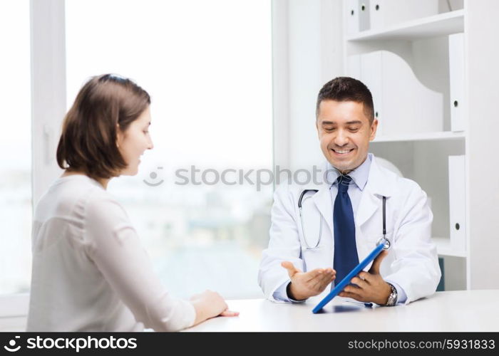 medicine, health care, technology and people concept - smiling doctor and woman with tablet pc computer meeting at clinic