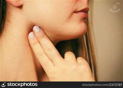Medicine health care. Woman checking pulse heart rate on neck closeup . Woman checking pulse on neck closeup