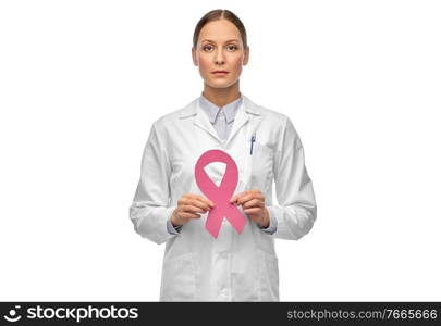 medicine, healthcare and oncology concept - female doctor in white coat with pink breast cancer awareness ribbon. female doctor with breast cancer awareness ribbon