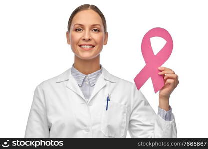 medicine, healthcare and oncology concept - happy smiling female doctor in white coat with pink breast cancer awareness ribbon. female doctor with breast cancer awareness ribbon