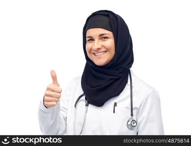 medicine, healthcare and people concept - smiling muslim female doctor wearing hijab and white coat with stethoscope