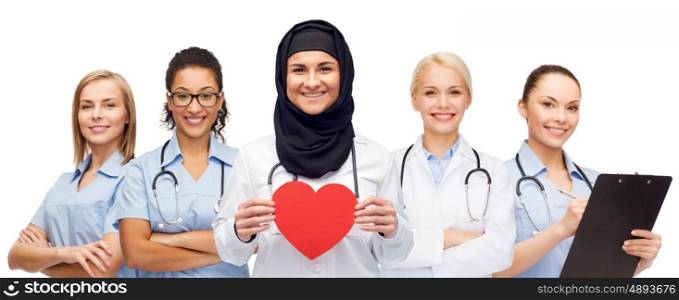 medicine, healthcare, charity and people concept - group of doctors with red heart and clipboard
