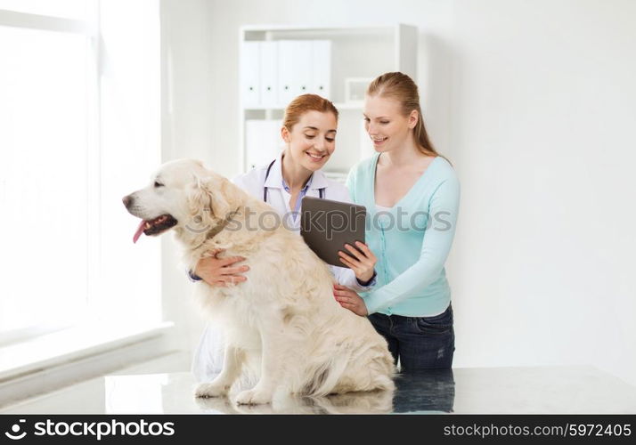 medicine, pet, health care, technology and people concept - happy woman with golden retriever dog and veterinarian doctor holding tablet pc computer at vet clinic