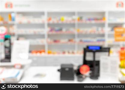 medicine, pharmaceutics and healthcare concept - blurry background of pharmacy. blurry background of pharmacy