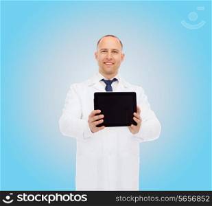 medicine, profession, advertisement and healthcare concept - smiling male doctor with tablet pc computer over blue background