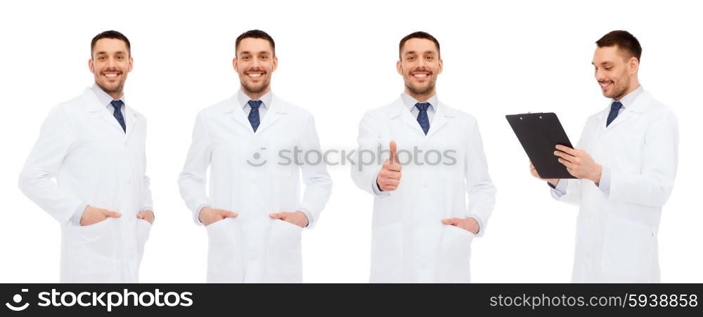 medicine, profession and health care concept - happy doctors with clipboard showing thumbs up