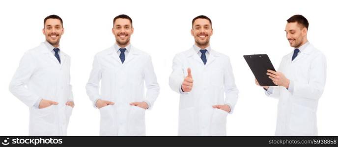 medicine, profession and health care concept - happy doctors with clipboard showing thumbs up