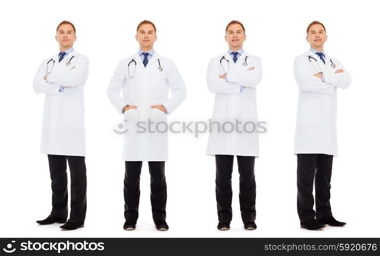 medicine, profession and health care concept - happy doctors with stethoscope