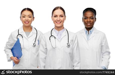 medicine, profession and healthcare concept - group of happy smiling doctors or nurses with stethoscopes and clipboard over white background. group of happy smiling female doctors or nurses