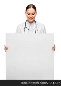 medicine, profession and healthcare concept - happy smiling female doctor holding white board. happy smiling female doctor holding white board