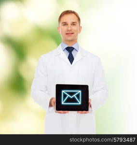 medicine, profession, and healthcare concept - smiling male doctor showing tablet pc computer screen over natural background