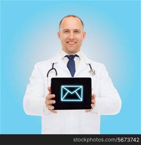 medicine, profession, and healthcare concept - smiling male doctor with stethoscope showing tablet pc computer screen over blue background