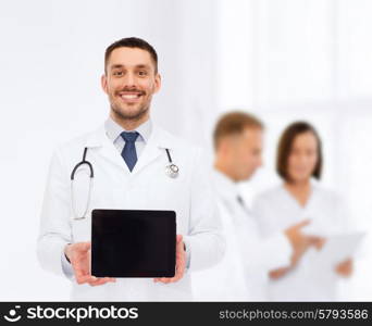 medicine, profession, and healthcare concept - smiling male doctor with tablet pc computer and stethoscope