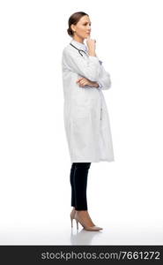 medicine, profession and healthcare concept - thinking female doctor in white coat. thinking female doctor in white coat