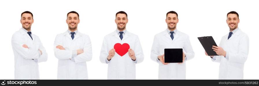 medicine, profession, cardiology and health care concept - happy doctors with red heart, tablet pc and clipboard