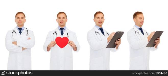 medicine, profession, cardiology, charity and health care concept - doctors with red heart and clipboard
