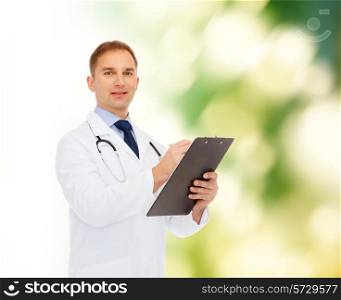 medicine, profession, environment and healthcare concept - smiling male doctor with clipboard and stethoscope writing prescription over natural background