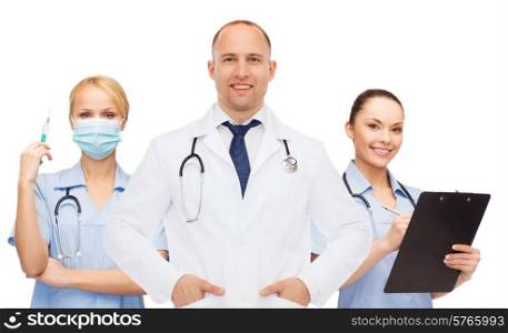 medicine, profession, teamwork and healthcare concept - international group of smiling medics or doctors with clipboard and stethoscopes over white background