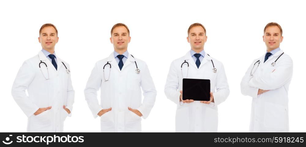 medicine, profession, technology and health care concept - happy doctors with tablet pc computer and stethoscope