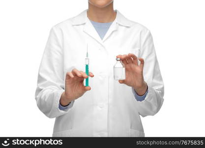 medicine, vaccination and healthcare concept - close up of female doctor or nurse with drug and syringe over white background. close up of doctor with medicine and syringe