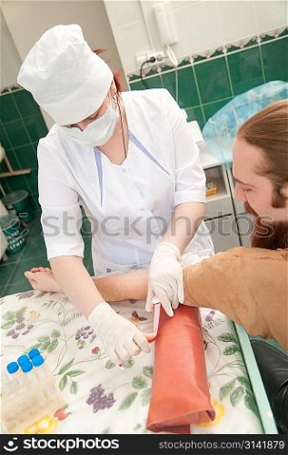 Medicine worker with patient at work