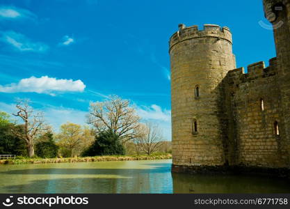 Medieval castle tower with moat