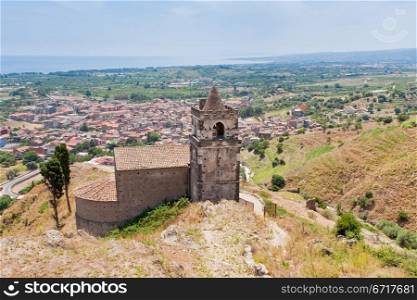 medieval chapel and view on seacoast in Sicily