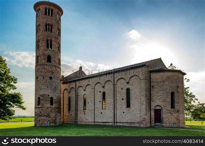 Medieval countryside church of Campanile with romanesque cylindrical bell tower, located in the village of Santa Maria in Fabriago in Emilia Romagna region in northern Italy