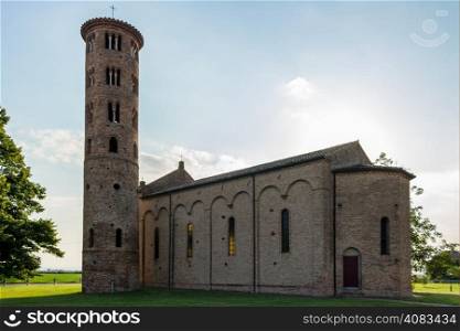 Medieval countryside church of Campanile with romanesque cylindrical bell tower, located in the village of Santa Maria in Fabriago in Emilia Romagna region in northern Italy