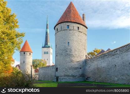 Medieval fortifications made of stone with towers in old Tallinn.. Tallinn. The fortress wall.