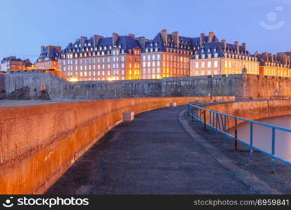 Medieval fortress Saint-Malo, Brittany, France. Night view of famous walled port city of Privateers Saint-Malo is known as city corsaire, Brittany, France