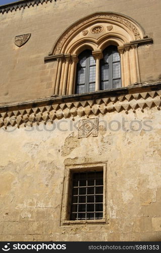 Medieval gothic window of an ancient house in the island of Malta