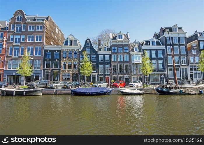 Medieval houses along the canal in Amsterdam the Netherlands