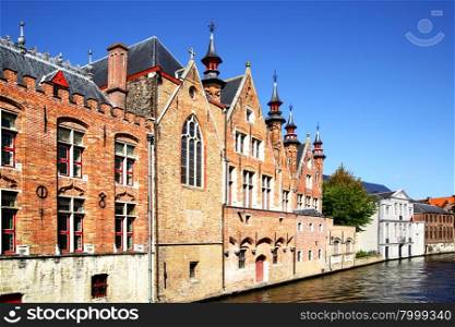 Medieval houses on canal in Bruges, Belgium