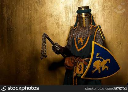 Medieval knight on golden background