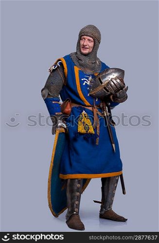 Medieval knight on grey background.